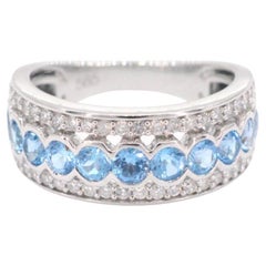 White gold pave ring with diamonds and topaz