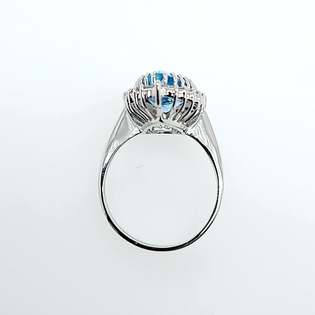 White Gold Pear Cut Aquamarine and Diamond Halo Cocktail Ring In Good Condition For Sale In Coral Gables, FL