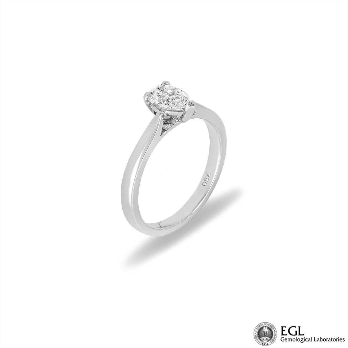 A beautiful white gold diamond engagement ring. The solitaire ring is set to the centre with a pear shaped diamond in a three prong mount weighing 0.75ct, H colour and SI2 clarity. The ring is currently a size UK N - EU 53 but can be adjusted for a