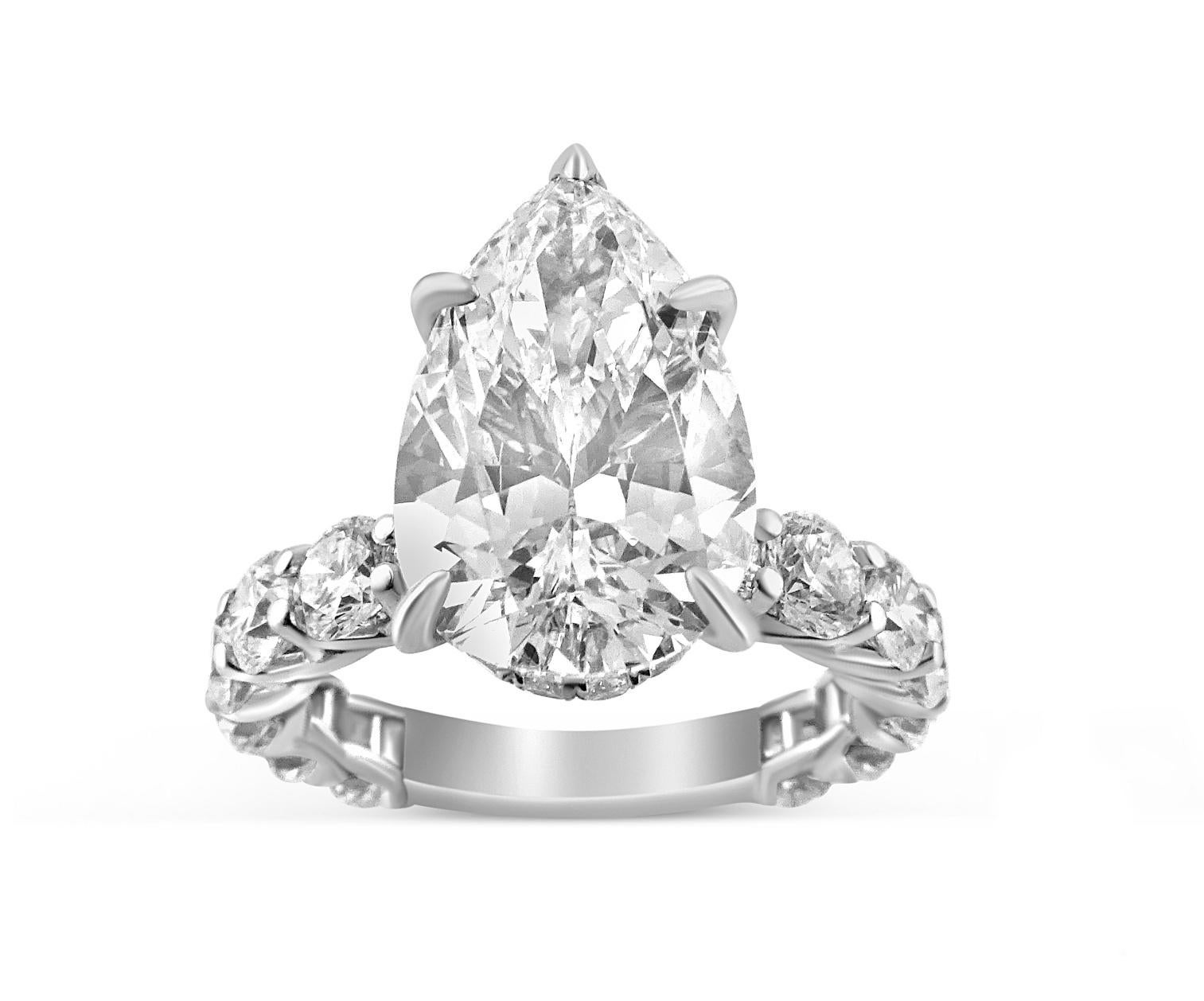 Modern White Gold Pear Cut Diamond Ring with Side Stones, 6.65 Carat For Sale