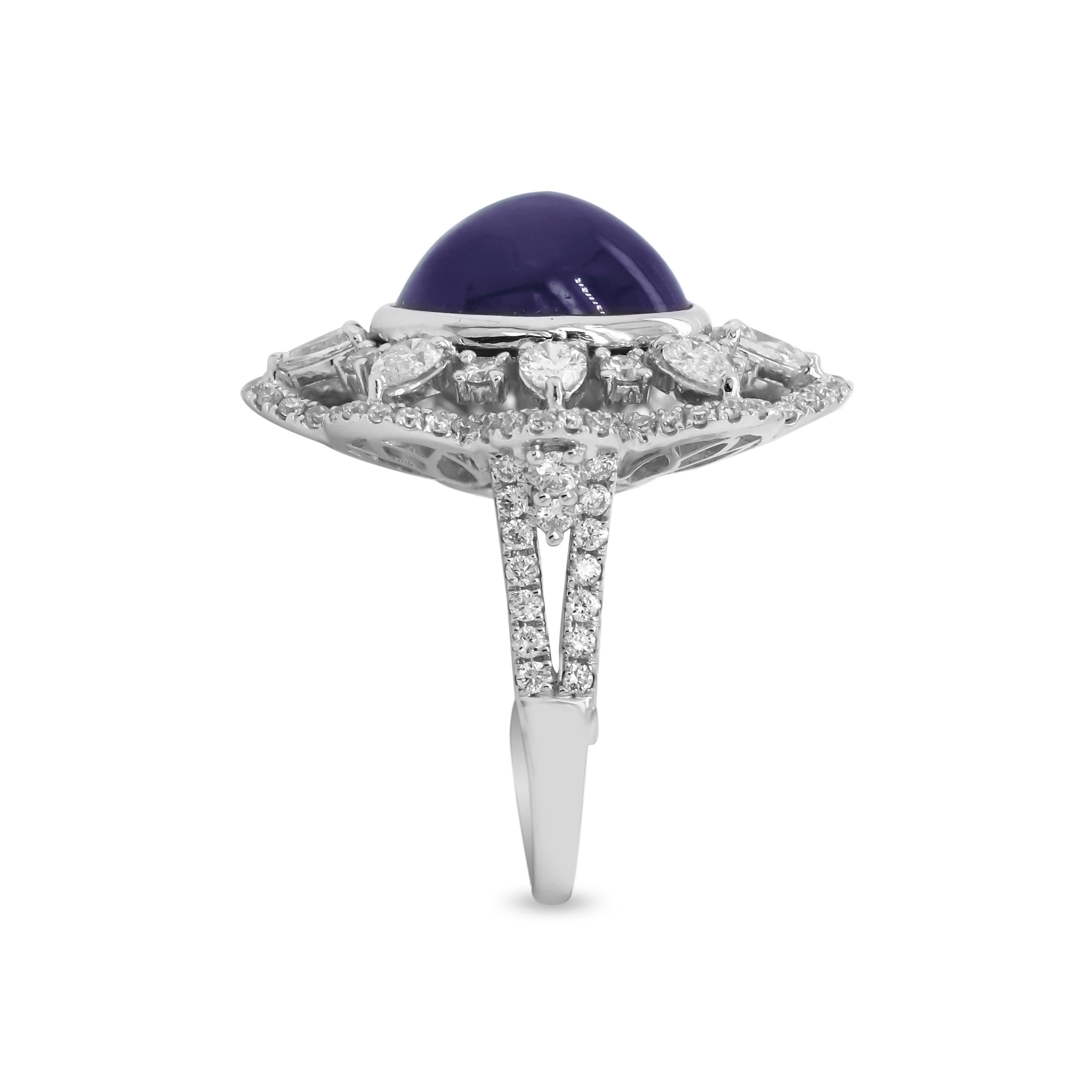 18k White Gold Pear Shape and Round Diamond Ring with Cabochon Blue Sapphire Center

This beautiful ring with an Oval, Cabochon Blue Sapphire Center & White Diamonds is truly a work of art.

9.77 carat Cabochon Blue Sapphire. 
0.87 carat G color, VS