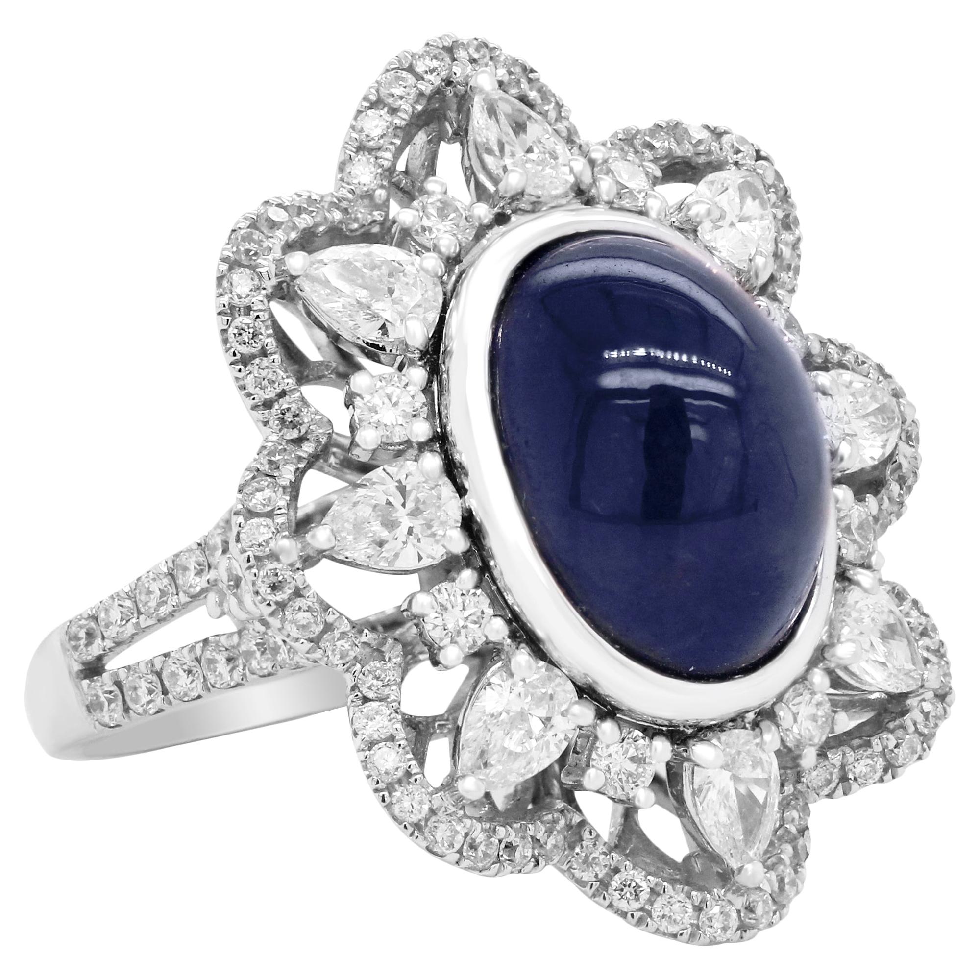 White Gold Pear Shape and Round Diamond Ring with Cabochon Blue Sapphire Center