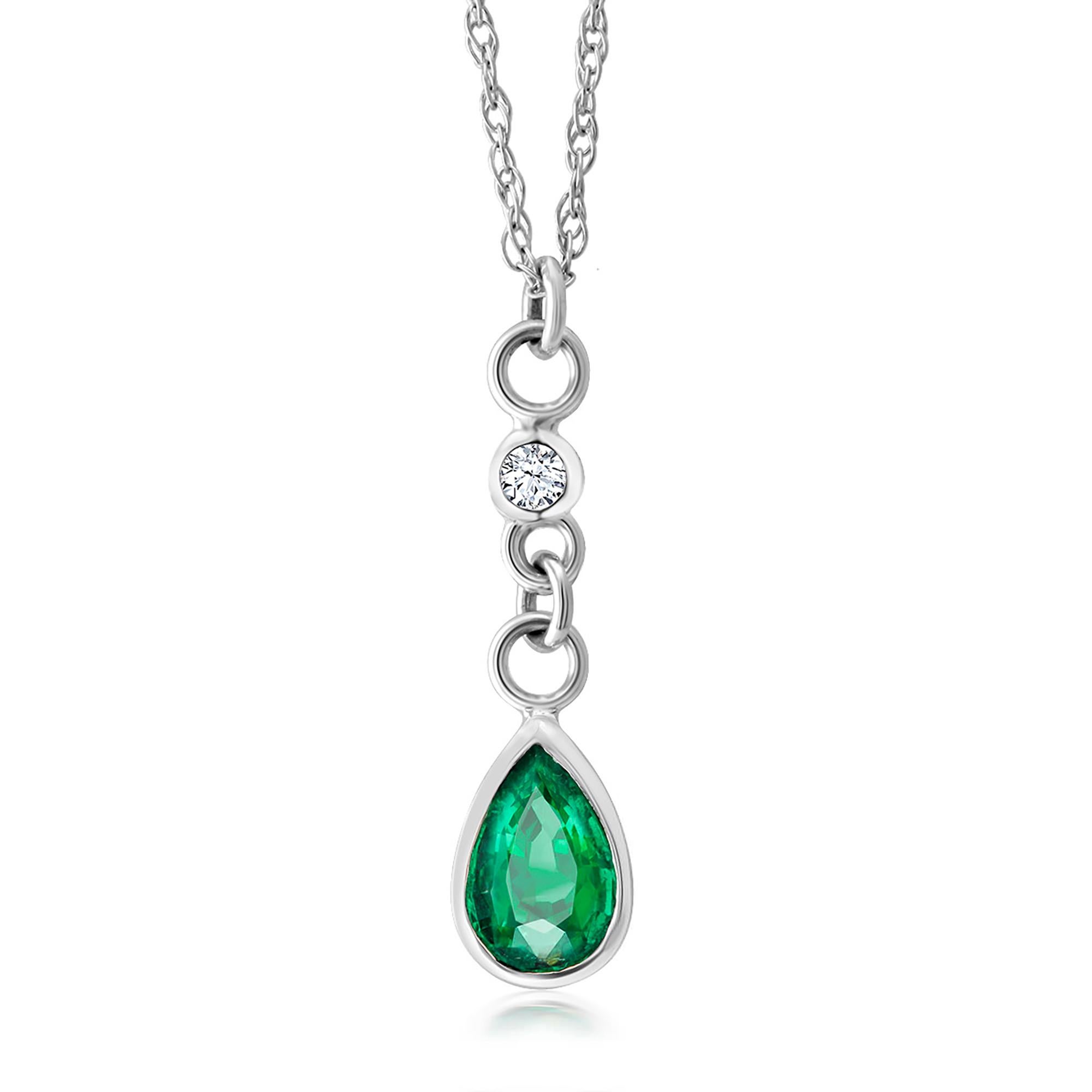 Pear Cut White Gold Pear Shape Emerald and Diamond Pendant Necklace Weighing 0.84 Carat