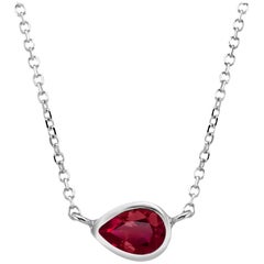 White Gold Pear Shape Ruby Bezel Set Pendant Necklace Weighing 0.95 Carat