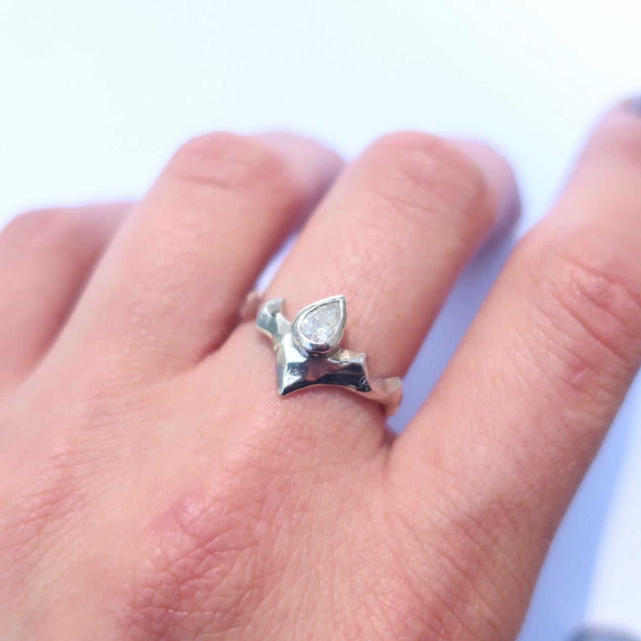 Artisan White Gold Pear Solitaire Ring with Angled Band