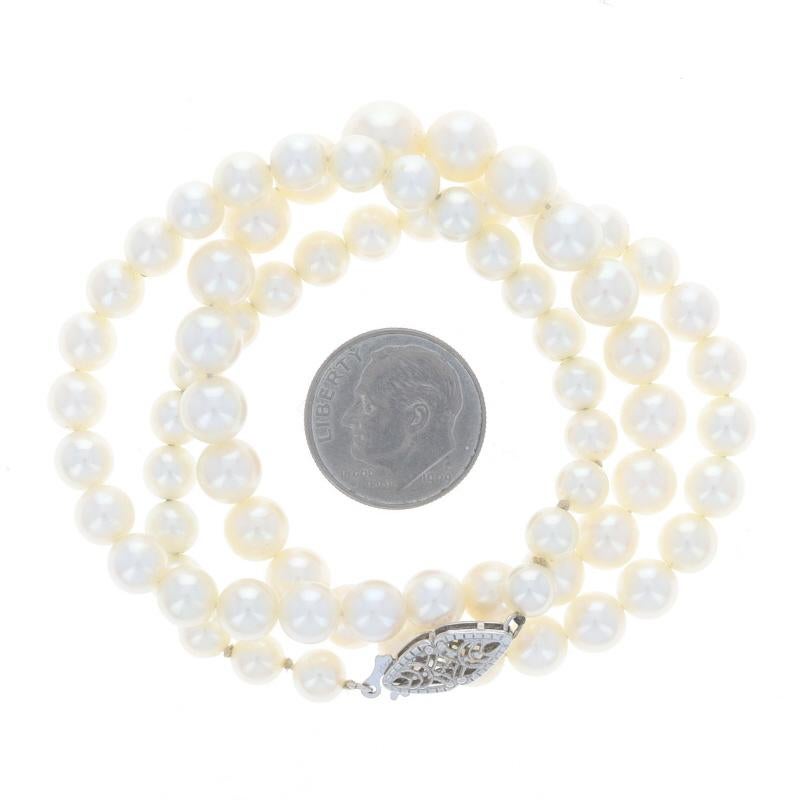 Collier en or blanc à perles graduées 18