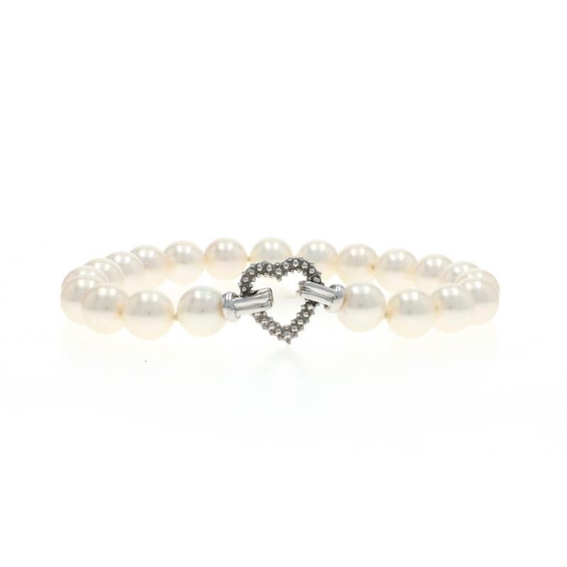 Metal Content: 14k White Gold

Stone Information

Cultured Pearls

Bracelet Style: Knotted Strand
Fastening Type: Fold-Over Clasp
Theme: Heart, Love

Measurements

Chain Width: 9/32