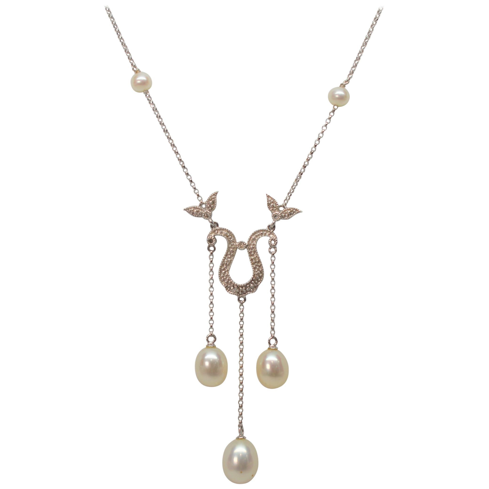 White Gold and Pearl Teardrop Pendant Necklace with Diamond Enhancements