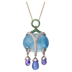 Pendentif en or blanc 18 carats avec diamants, aigue-marine, tanzanites et tsavorites