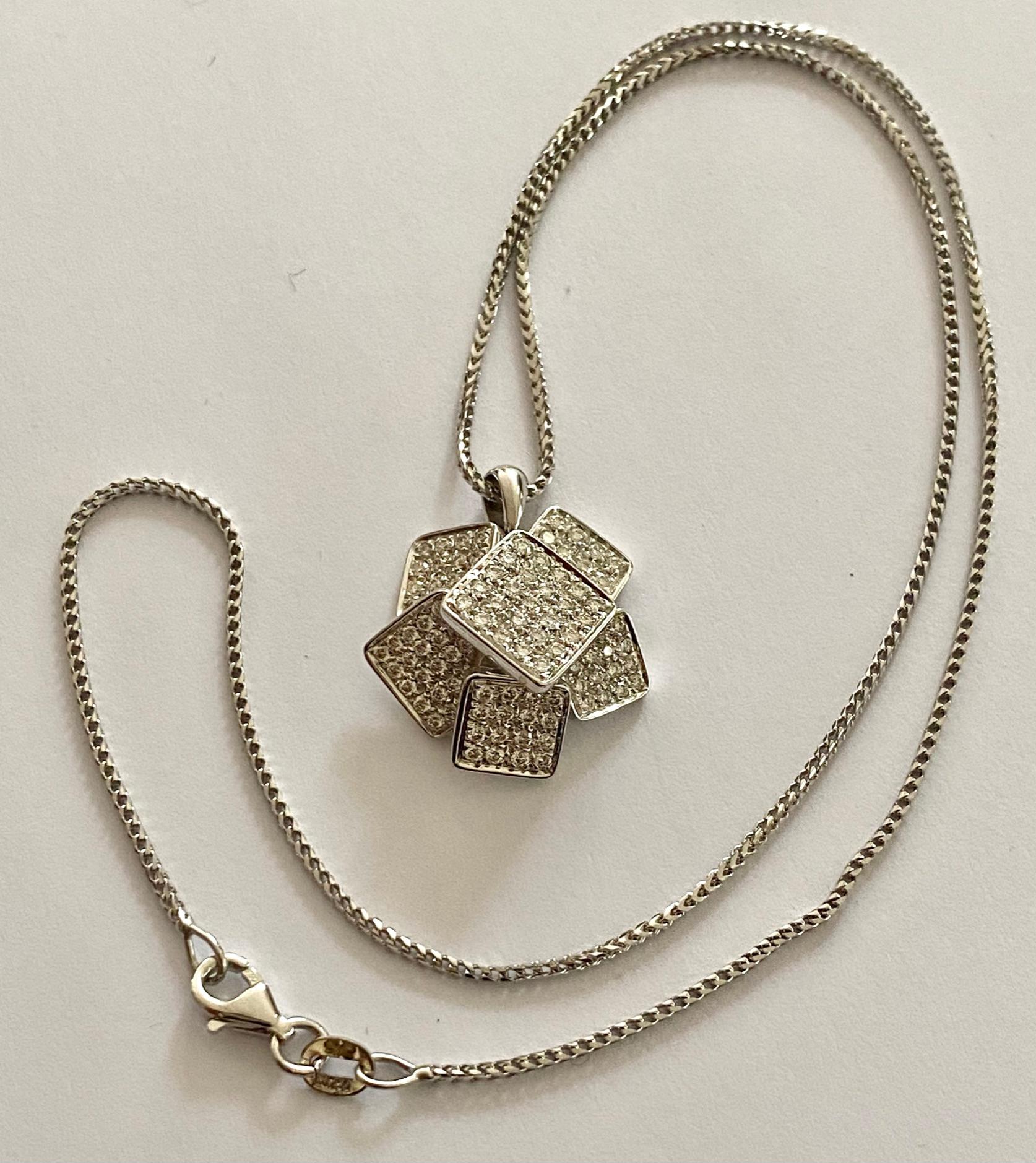 Modernist White Gold Pendant Set with 107 Diamonds and a Necklace For Sale