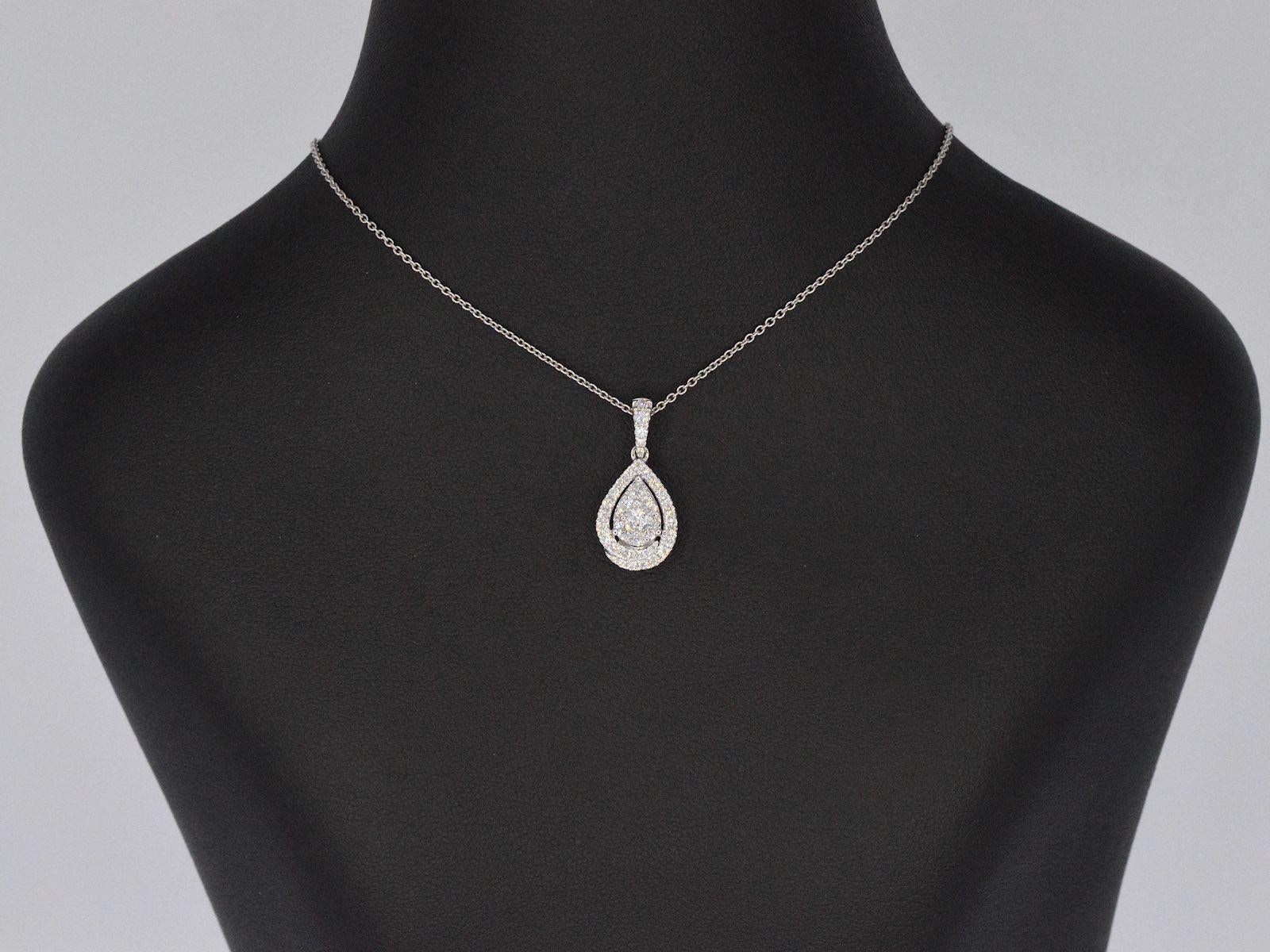 Introducing a beautiful pendant featuring naturally shiny diamonds with a total weight of 0.75 carat. These diamonds are brilliant-cut, offering excellent sparkle and shine. With a color grading of F-G and a purity of VS, these diamonds reflect