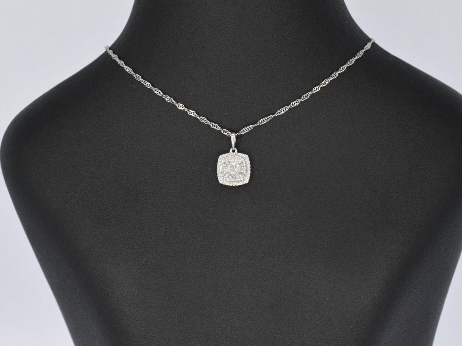 Introducing a beautiful pendant that combines the elegance of brilliant-cut and baguette-cut diamonds. This pendant contains 0.55 carats of diamonds with a color grading of F-G and a clarity range from SI to P. The diamonds are of good quality,