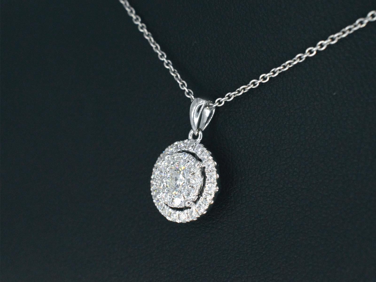 Contemporary White gold pendant with diamonds For Sale