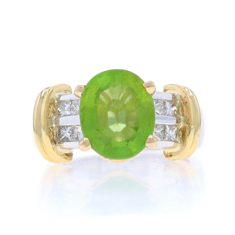 Size: 7 1/2
Sizing Fee: Up 1/2 a size for $80 or Down 1/2 a size for $80

Metal Content: 14k White Gold & 18k Yellow Gold

Stone Information

Natural Peridot
Carat(s): 4.14ct (weighed)
Cut: Oval
Color: Green

Natural Diamonds
Carat(s): .48ctw
Cut:
