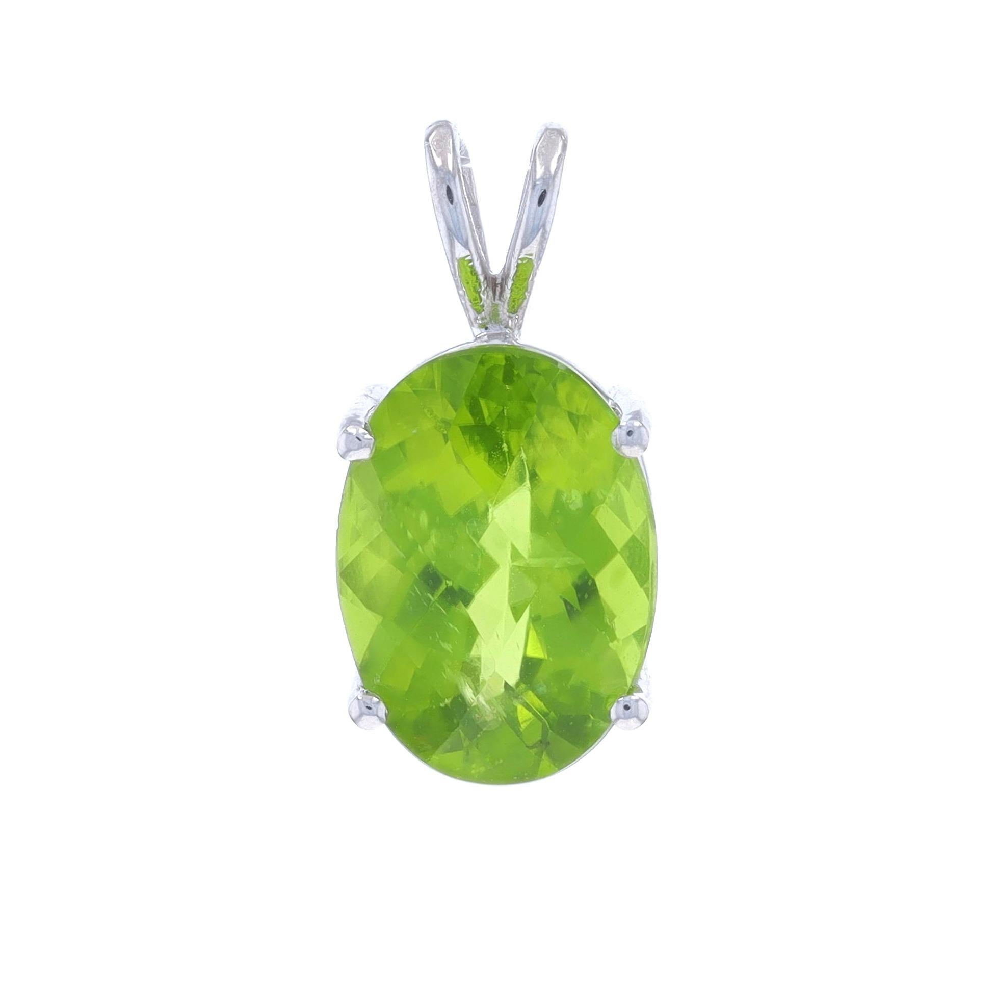 Metal Content: 14k White Gold

Stone Information

Natural Peridot
Carat(s): 5.83ct
Cut: Oval Checkerboard
Color: Green

Total Carats: 5.83ctw

Style: Solitaire

Measurements

Tall (from stationary bail): 25/32