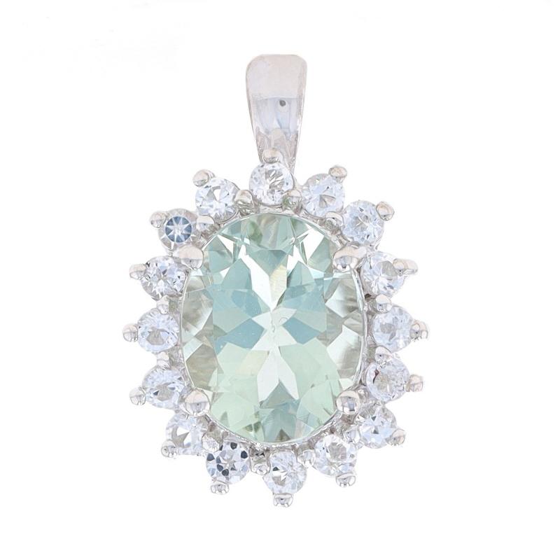 Metal Content: 14k White Gold

Stone Information

Natural Prasiolite
Carat(s): 2.18ct
Cut: Oval
Color: Light Green

Natural White Quartz
Carat(s): .65ctw
Cut: Round

Total Carats: 2.83ctw

Style: Halo
Theme: Floral

Measurements

Tall (from