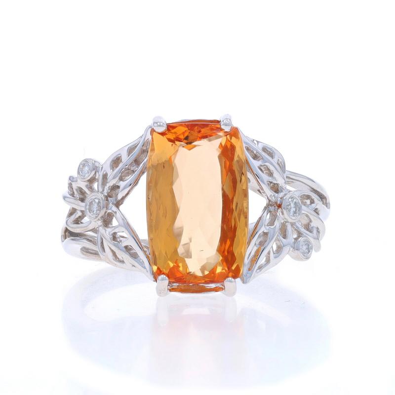 Size: 7 1/4
Sizing Fee: Up 2 sizes for $40 or Down 1 size for $40

Metal Content: 14k White Gold

Stone Information

Natural Topaz
Carat(s): 3.20ct
Cut: Cushion
Color: Precious (orange)

Natural Diamonds
Carat(s): .05ctw
Cut: Round Brilliant
Color: