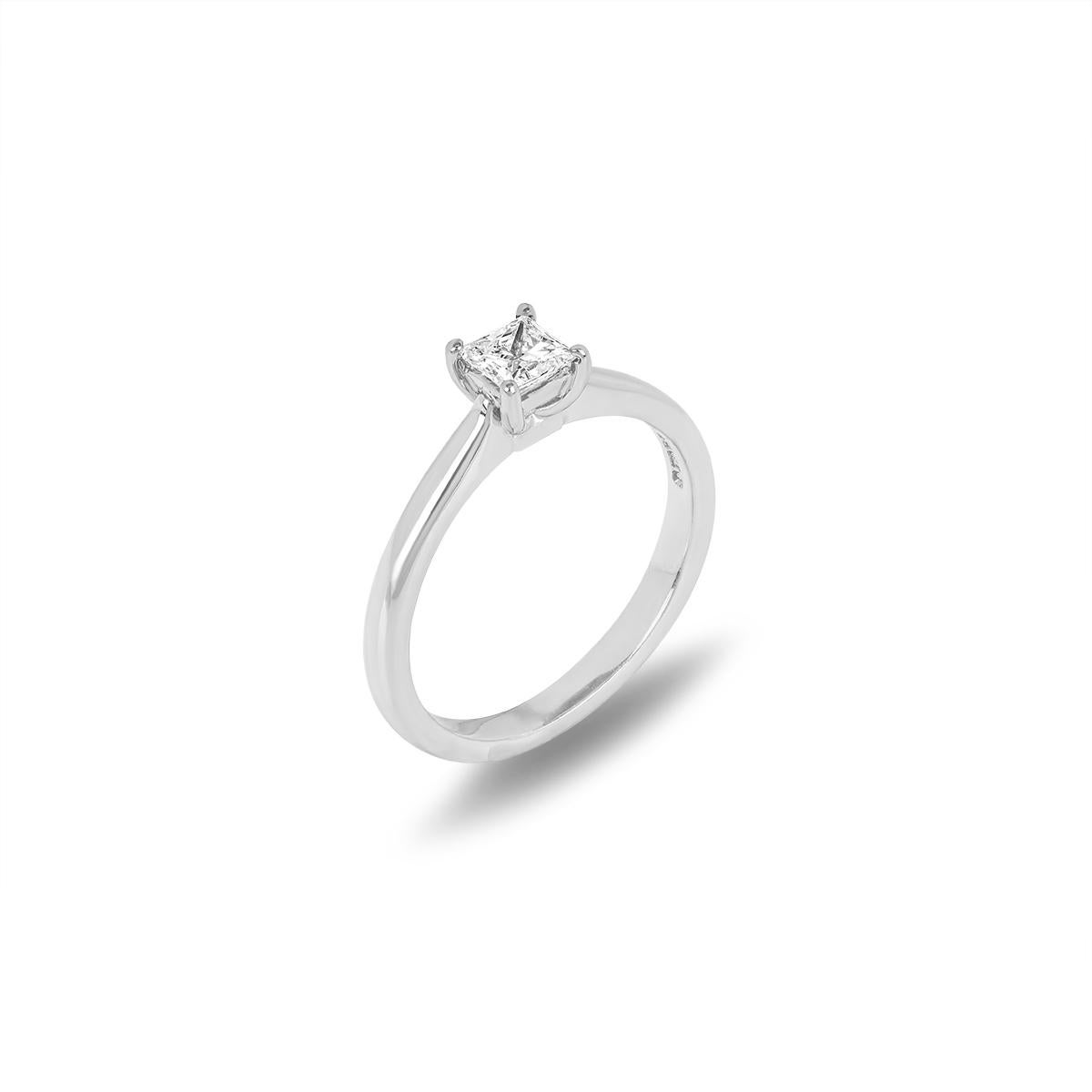 A beautiful single stone diamond ring in 18k white gold. The engagement ring is set to the centre in a four prong mount with a princess cut diamond weighing 0.30ct, H colour and VS1 clarity. The 2mm solitaire has a gross weight of 3.20 grams and is