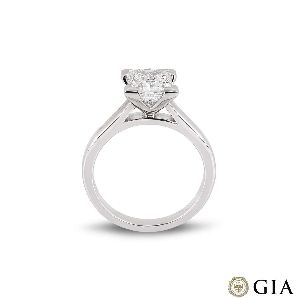 An outstanding single stone princess cut diamond ring set in 18k white gold. The princess cut diamond weighs 2.01ct, is G colour and VS1 clarity. The diamond is set within a contemporary four claw setting on a 2.5mm band. The ring is currently a US
