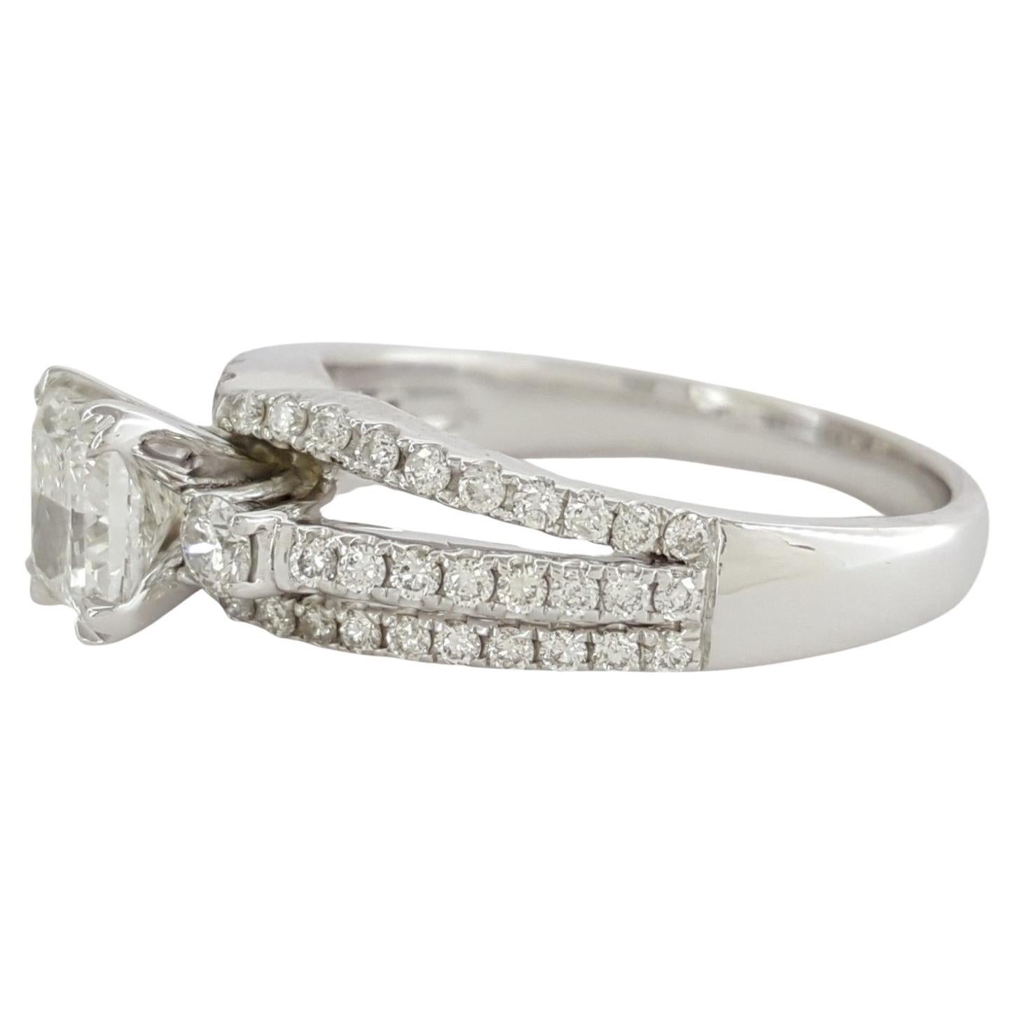 White Gold Radiant Cut Diamond Engagement Ring. 



The ring weighs 4.6 grams, size 7.25, the center stone is a Radiant Cut diamond weighing 0.90 ct, F in color, SI1 in clarity. 