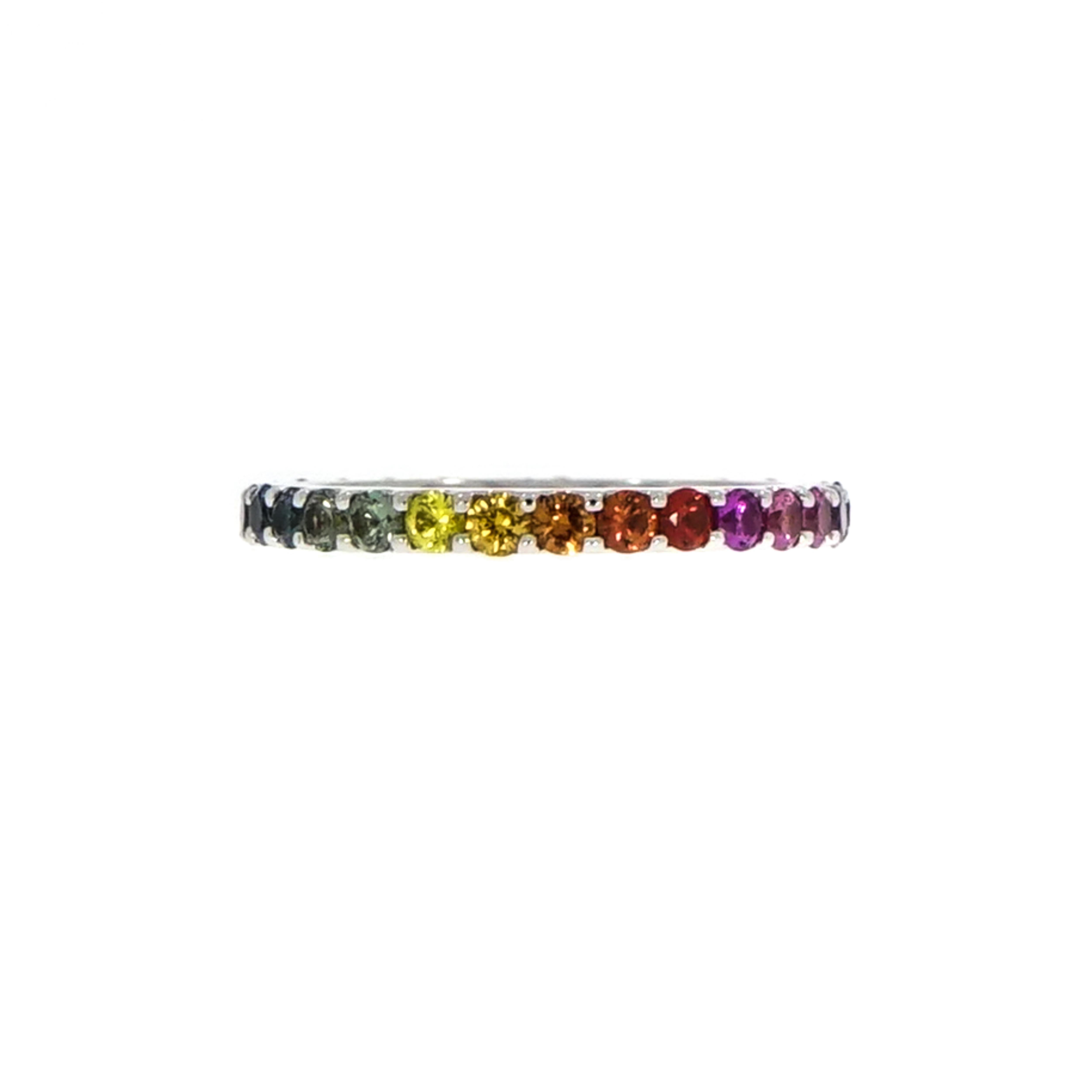Modern, refined and sparkly with lots of colors!!! This feminine ring can be a timeless heirloom, showcasing natural colored sapphires in all spectrum of the rainbow. 
This handmade band consists of 29 round sapphires perfectly french set in 18k