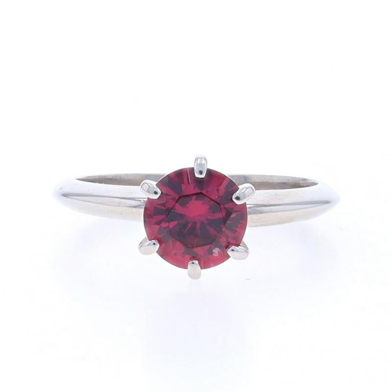 Size: 6
Sizing Fee: Up 5 sizes for $40 or Down 3 sizes for $30

Metal Content: 14k White Gold

Stone Information

Natural Rhodolite Garnet
Carat(s): 1.44ct
Cut: Round
Color: Purplish Red

Total Carats: 1.44ct

Style: Solitaire
Features: Knife-Edge