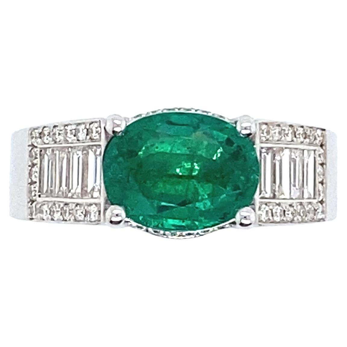 White Gold Ring Surmounted by an Natural Emerald with Diamonds For Sale