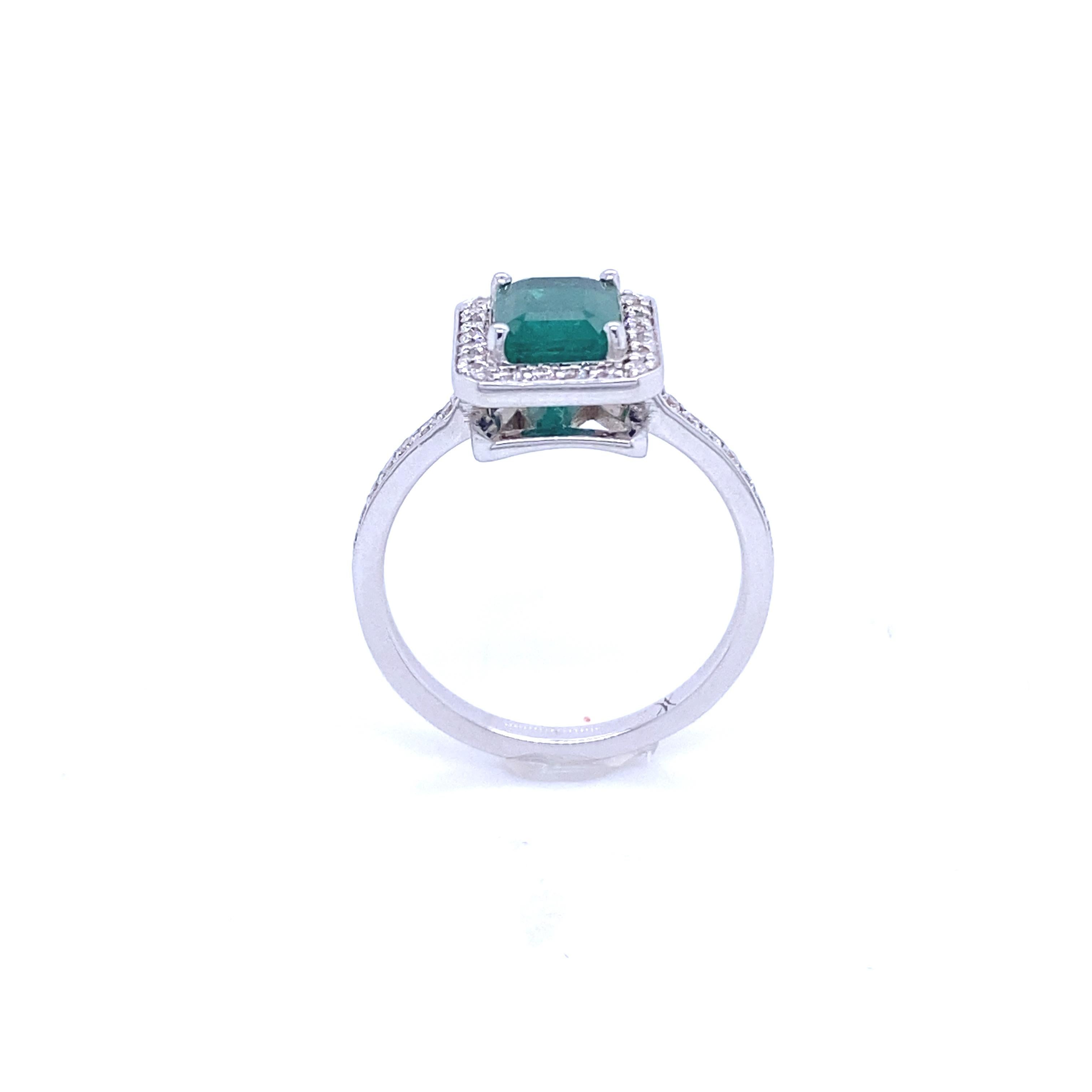 Art Deco Ring Surmounted by an RPC-Cut Emerald Surrounded by Diamonds White Gold 18 Karat For Sale