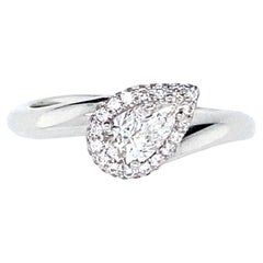 White Gold Ring Tapped with a Certified Pear Diamonds