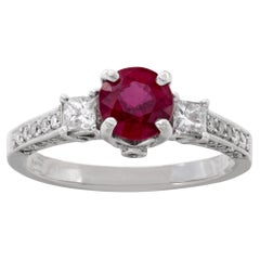 White gold ring w/ approx 0.80 ct princess cut ruby w/ approx 0.30 ct of diamond