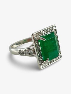 White Gold Ring with 6 ct Emerald and Diamonds