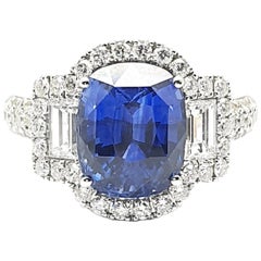 White Gold Ring with a 5.50 Carat Pillow Shaped Faceted Sapphire and Diamonds