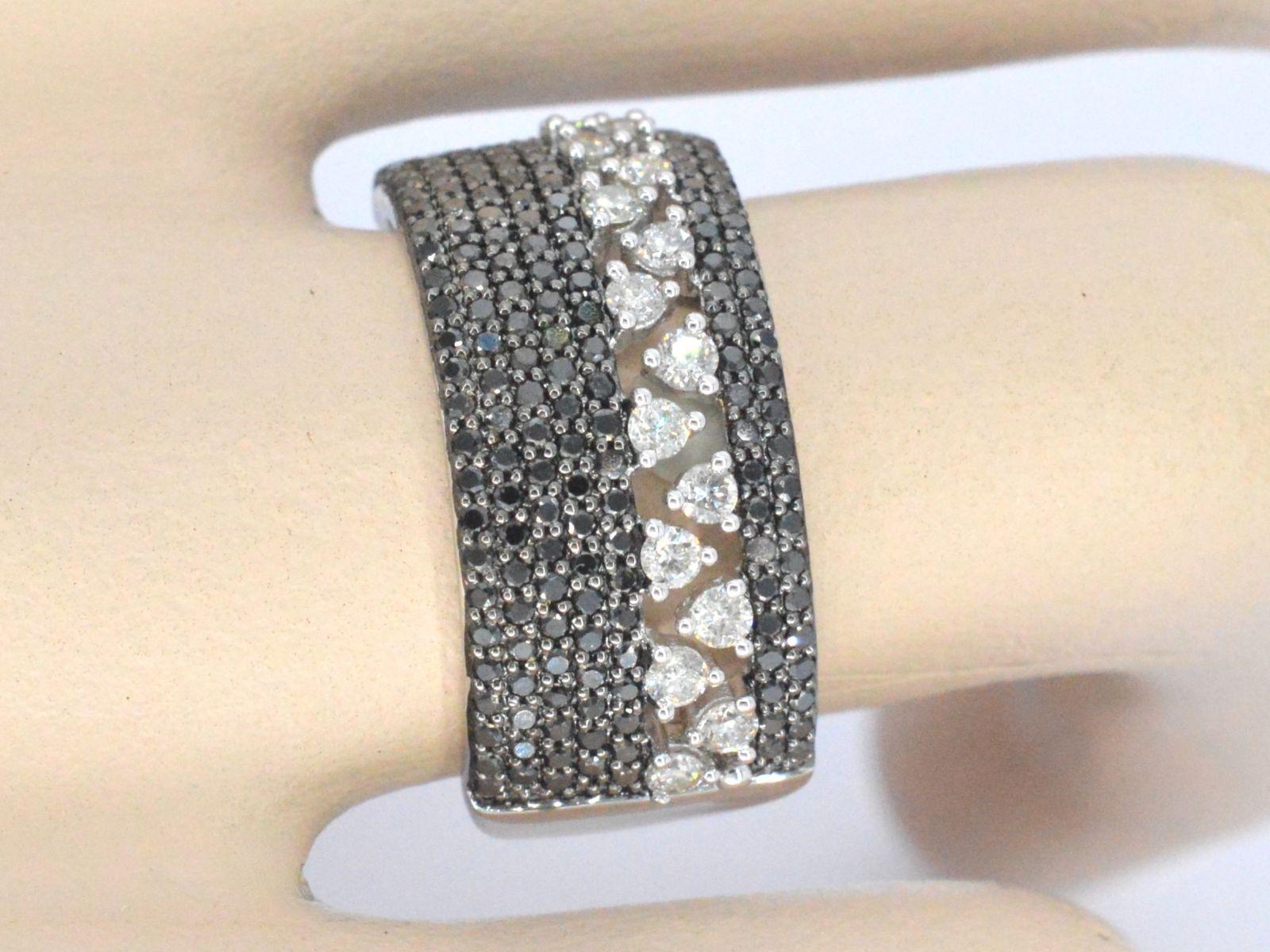 Contemporary White Gold Ring with Black Diamonds For Sale