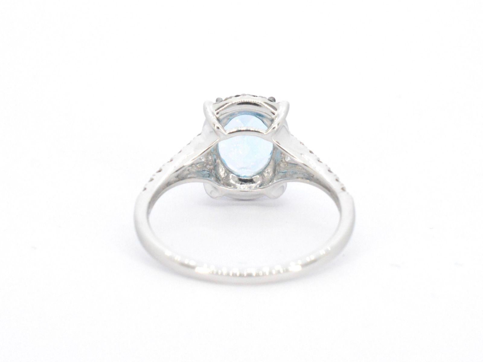 Brilliant Cut White Gold Ring with Diamonds and Beautiful Topaz with Sapphire For Sale