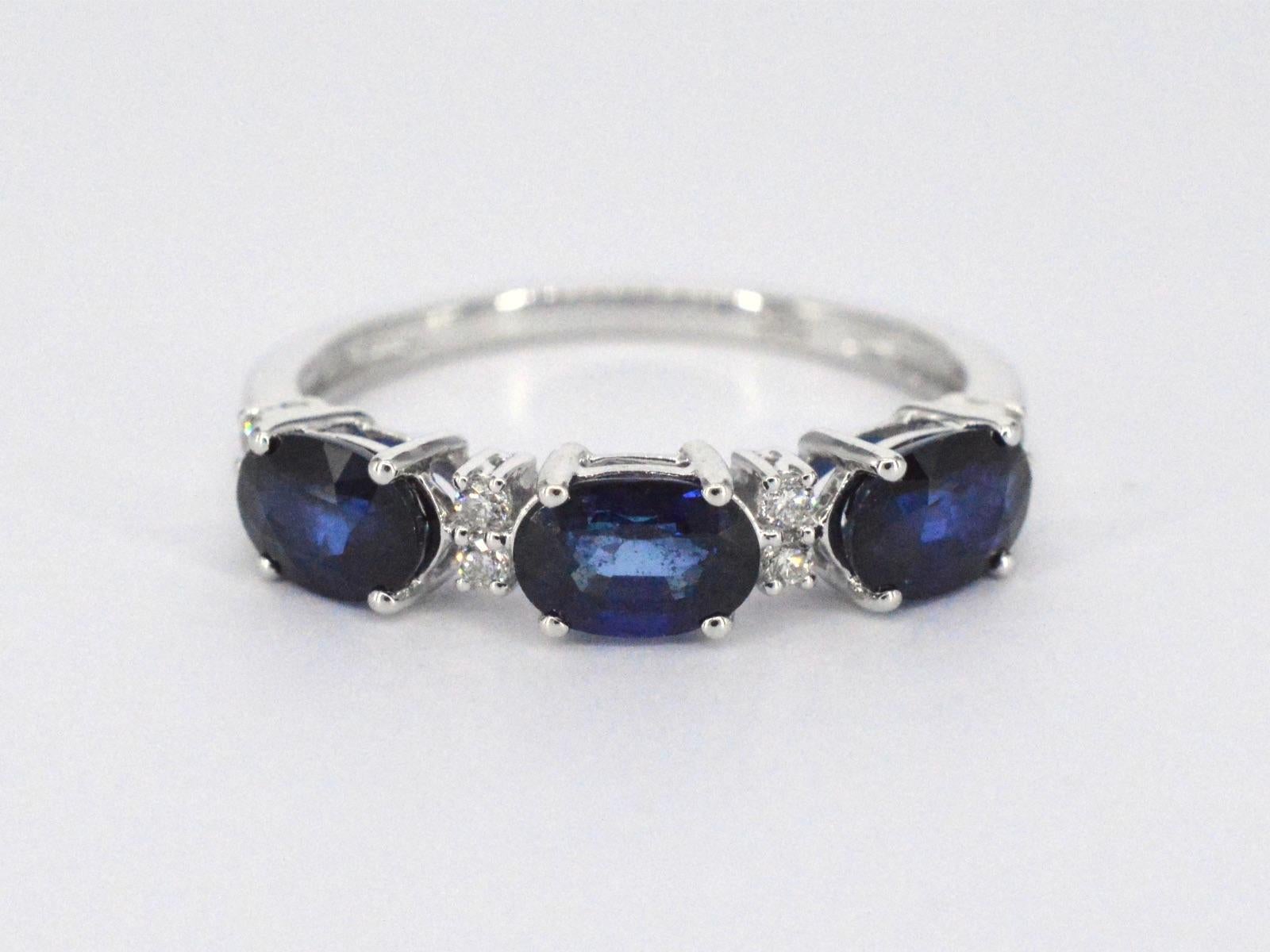 Women's White Gold Ring with Diamonds and Sapphire For Sale