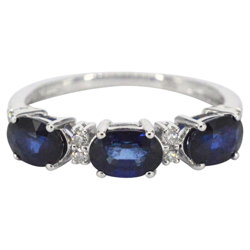 Bague en or blanc avec diamants et saphirs