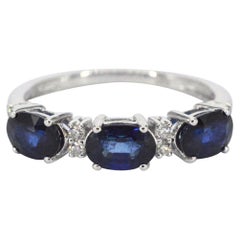 Bague en or blanc avec diamants et saphirs