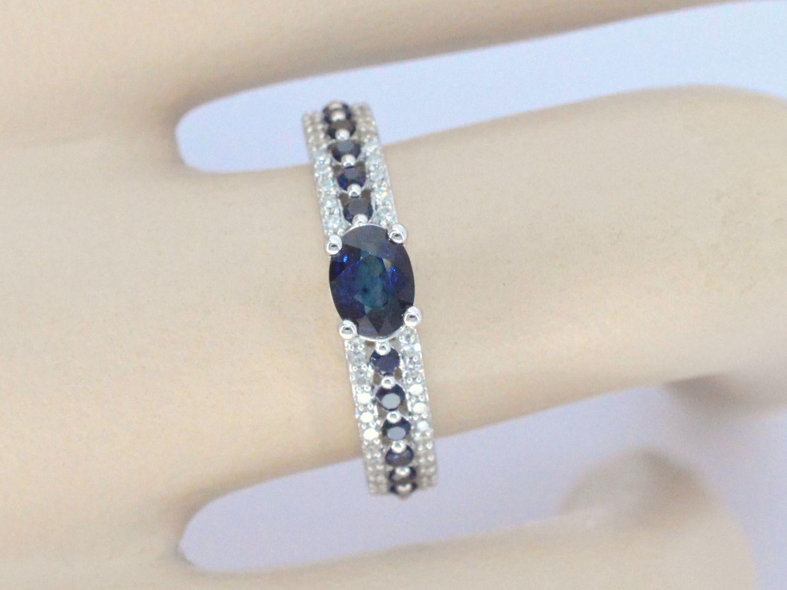 Contemporary White Gold Ring with Diamonds and Sapphires For Sale