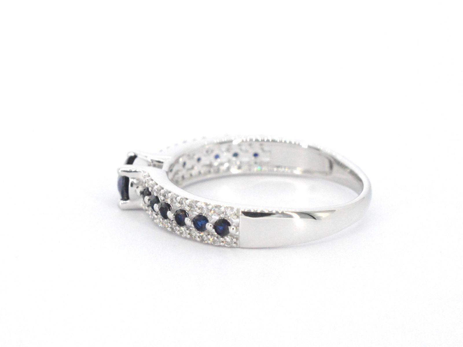 Women's White Gold Ring with Diamonds and Sapphires For Sale