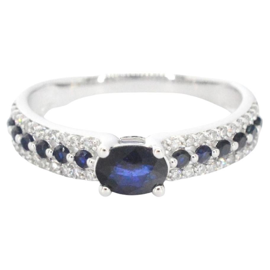 White Gold Ring with Diamonds and Sapphires For Sale