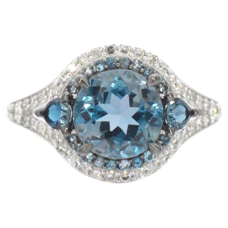 White Gold Ring with Diamonds and Topaz For Sale
