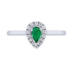 White gold ring with emerald