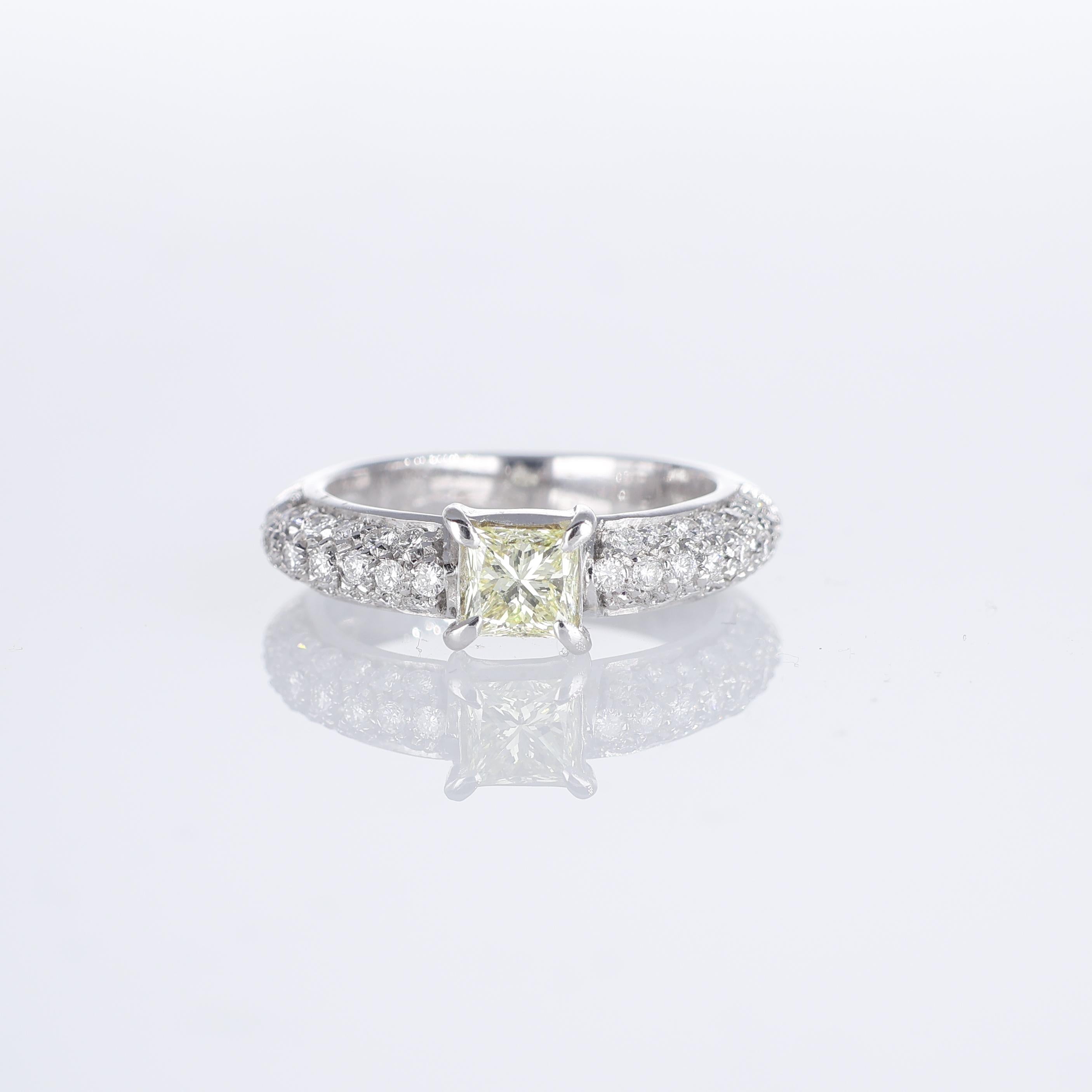 IMPORTANT NOTE:
✔ No additional costs will be added to this order.
✔ Shipping and customs duties are fully covered by us.
--------------------
A stunning 18k white gold ring showcasing a vibrant 0.55-carat fancy yellow princess-cut diamond as its