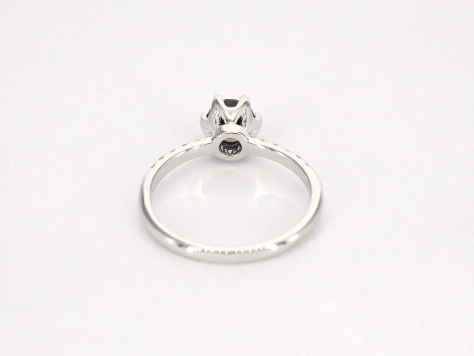 White Gold Ring with One Brilliant Cut Black Diamond and White Diamonds For Sale 2