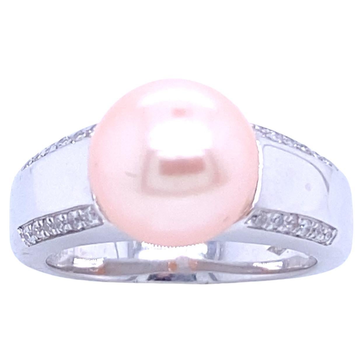 Bague en or blanc avec perle rose et diamants