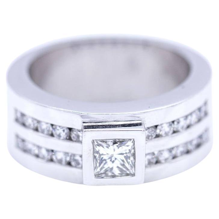 White gold ring with princess diamond.