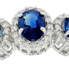 White gold ring with sapphires and diamonds