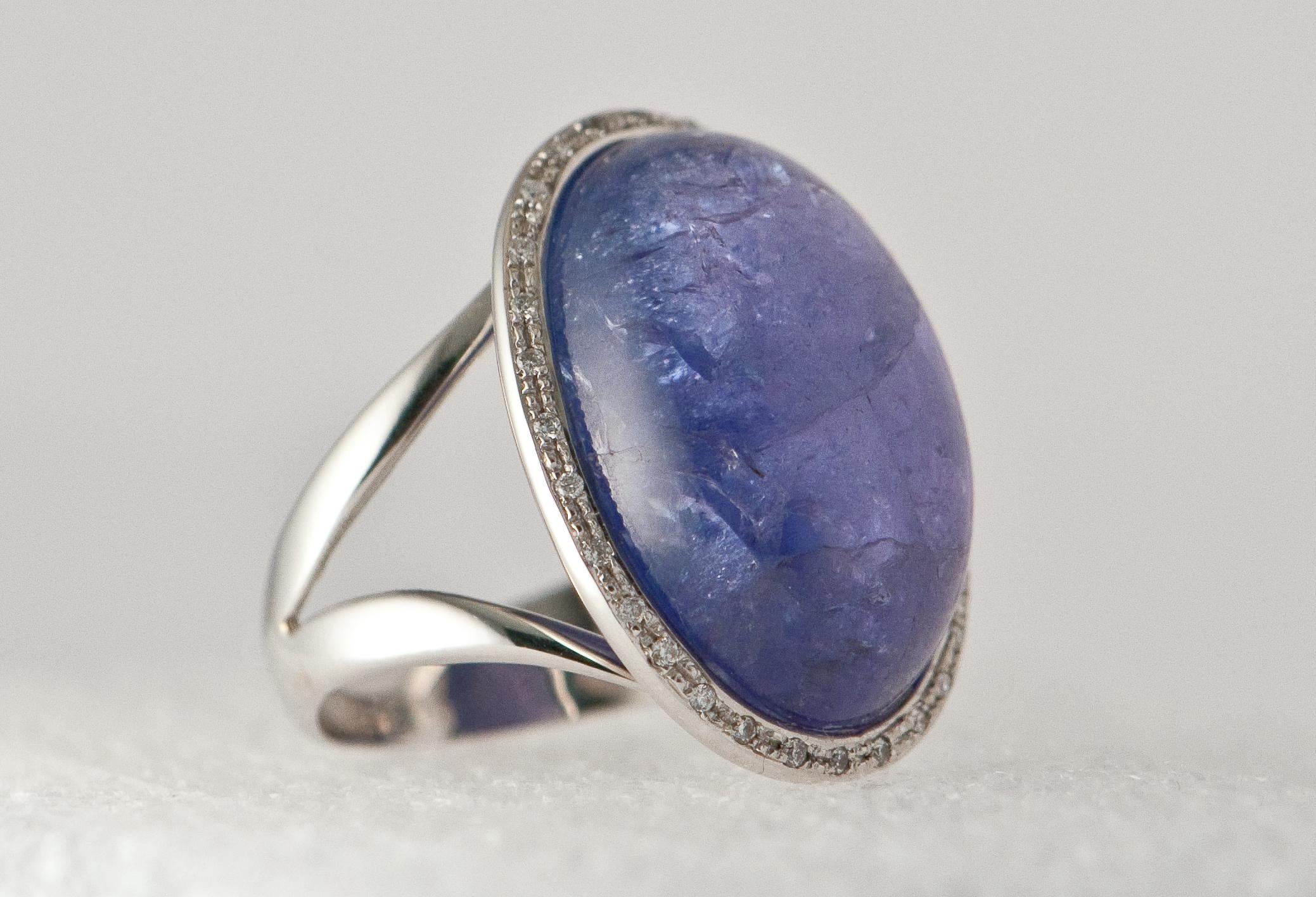 Oval Cut White Gold Ring with Tanzanite, Ornamented with Diamonds