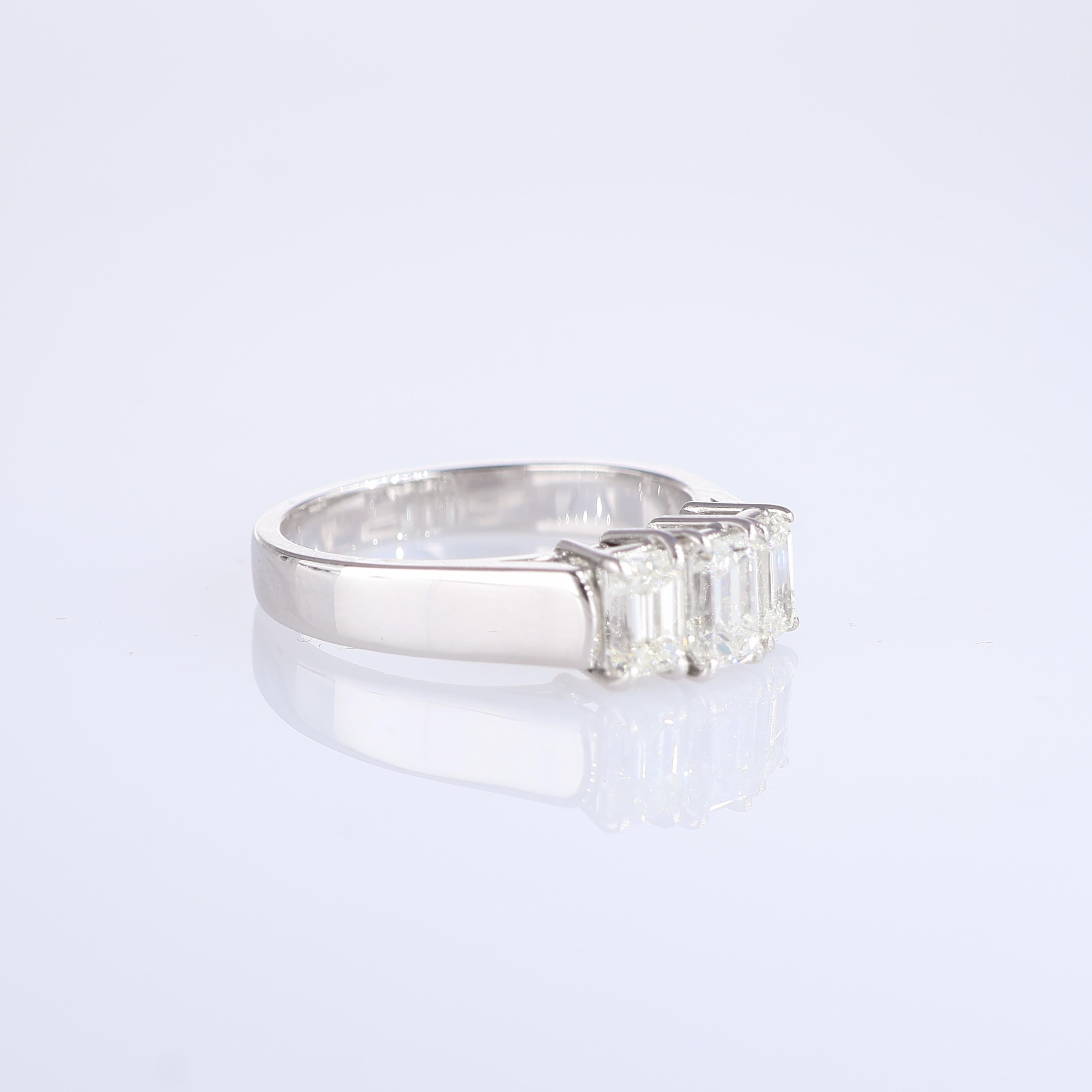 Emerald Cut White Gold Ring with Three Emerald-Cut Diamonds For Sale