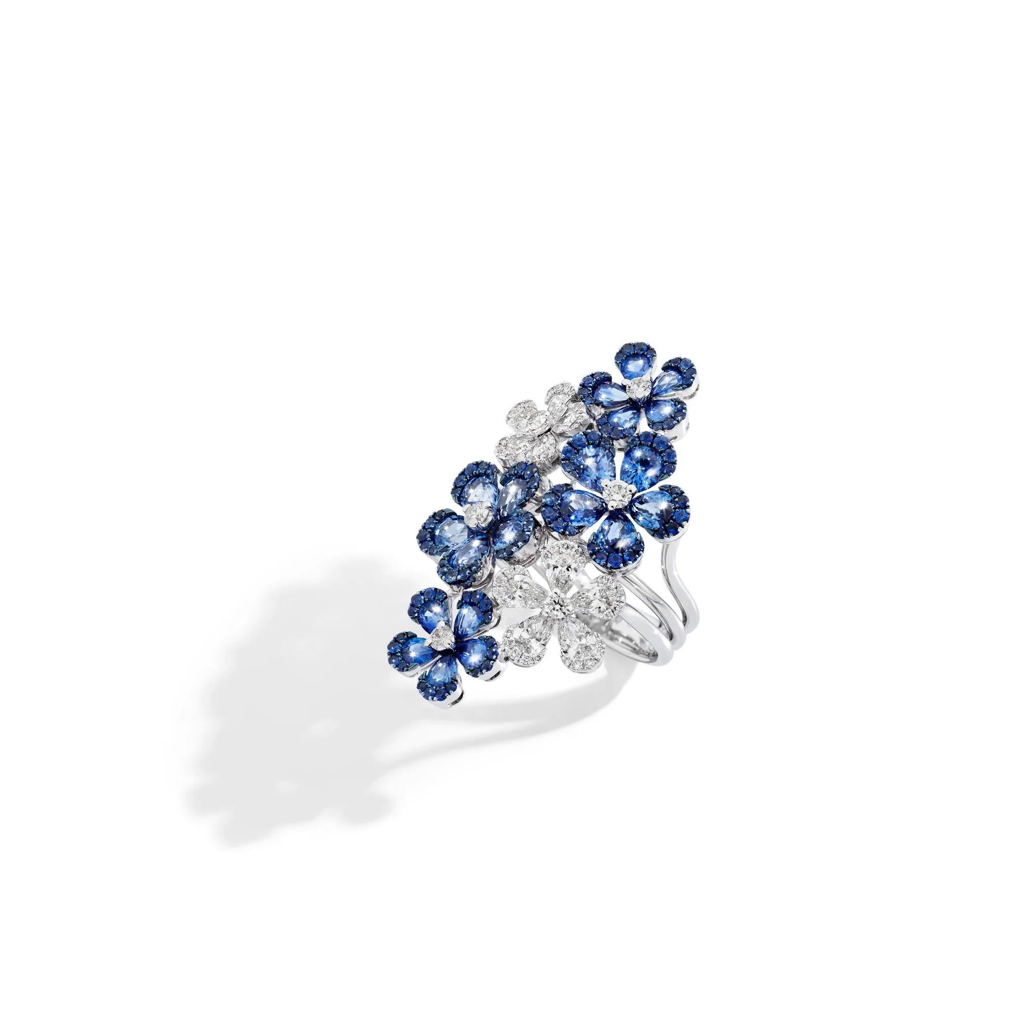 En vente :  Bague en or blanc avec diamants blancs et saphirs bleus 3